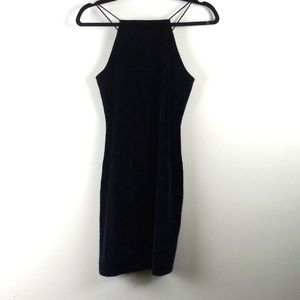 Black , halter dress. It has a square front neckline